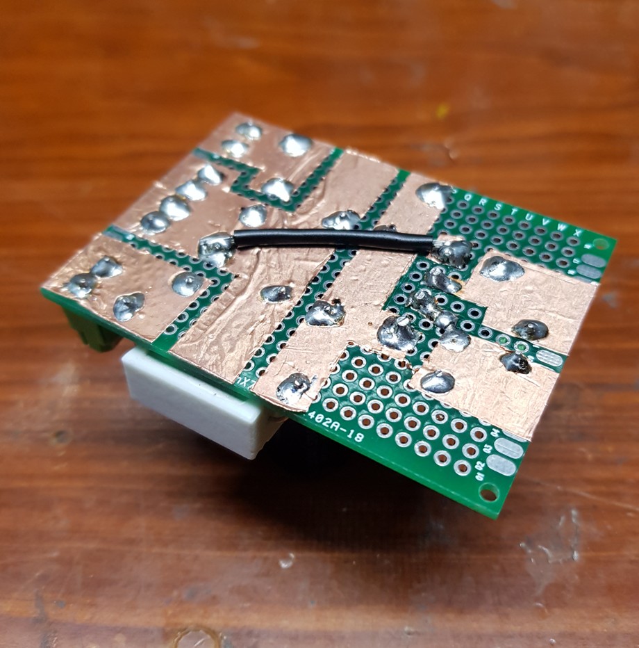 Foil side of the completed power supply board.