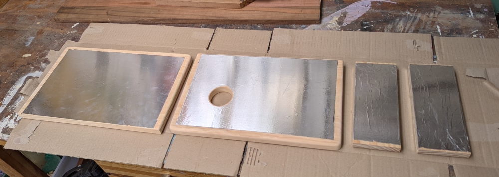 The pieces of the box after foil application and ready for assembly.