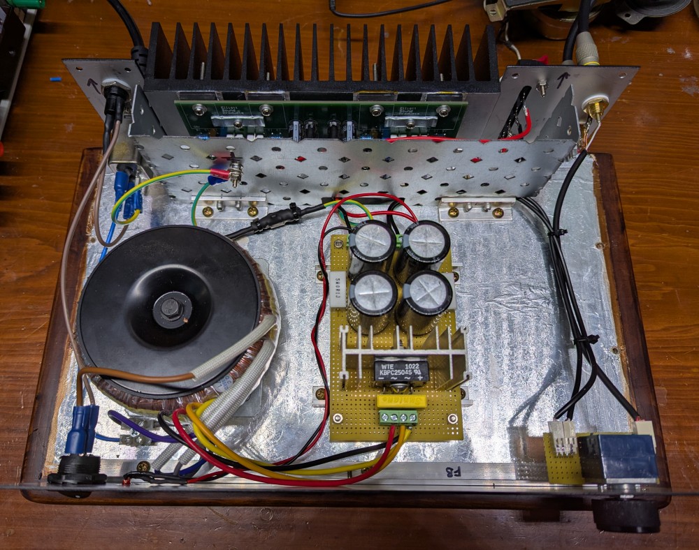Final internal layout once wiring was completed. I also made a shield to go around the amplifier board to reduce noise.