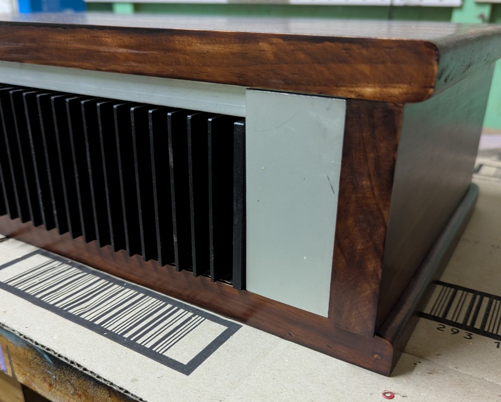 Checking the fit of a blank panel before proceeding.