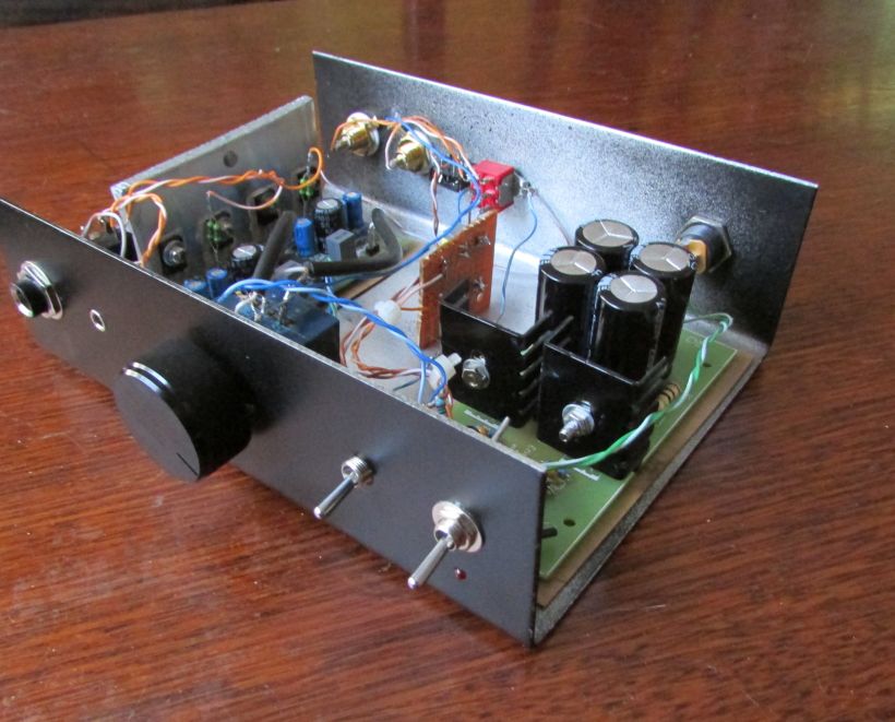 Mid-way through a wiring tidy-up. The board on the left is the amp, the right is the supply and the little piece of veroboard in the middle is the crossfeed circuit.