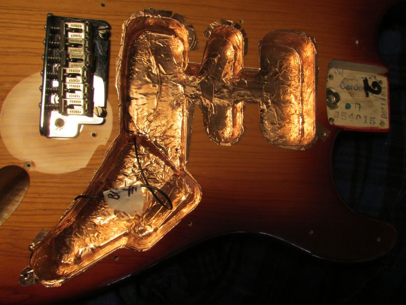 stratocaster with copper foil shielding applied close-up
